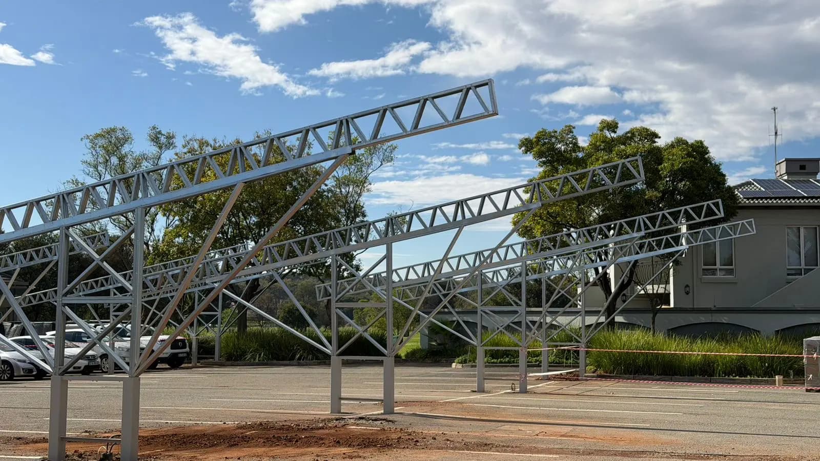 Solar carport steel structures during installation at Centurion Golf Club
