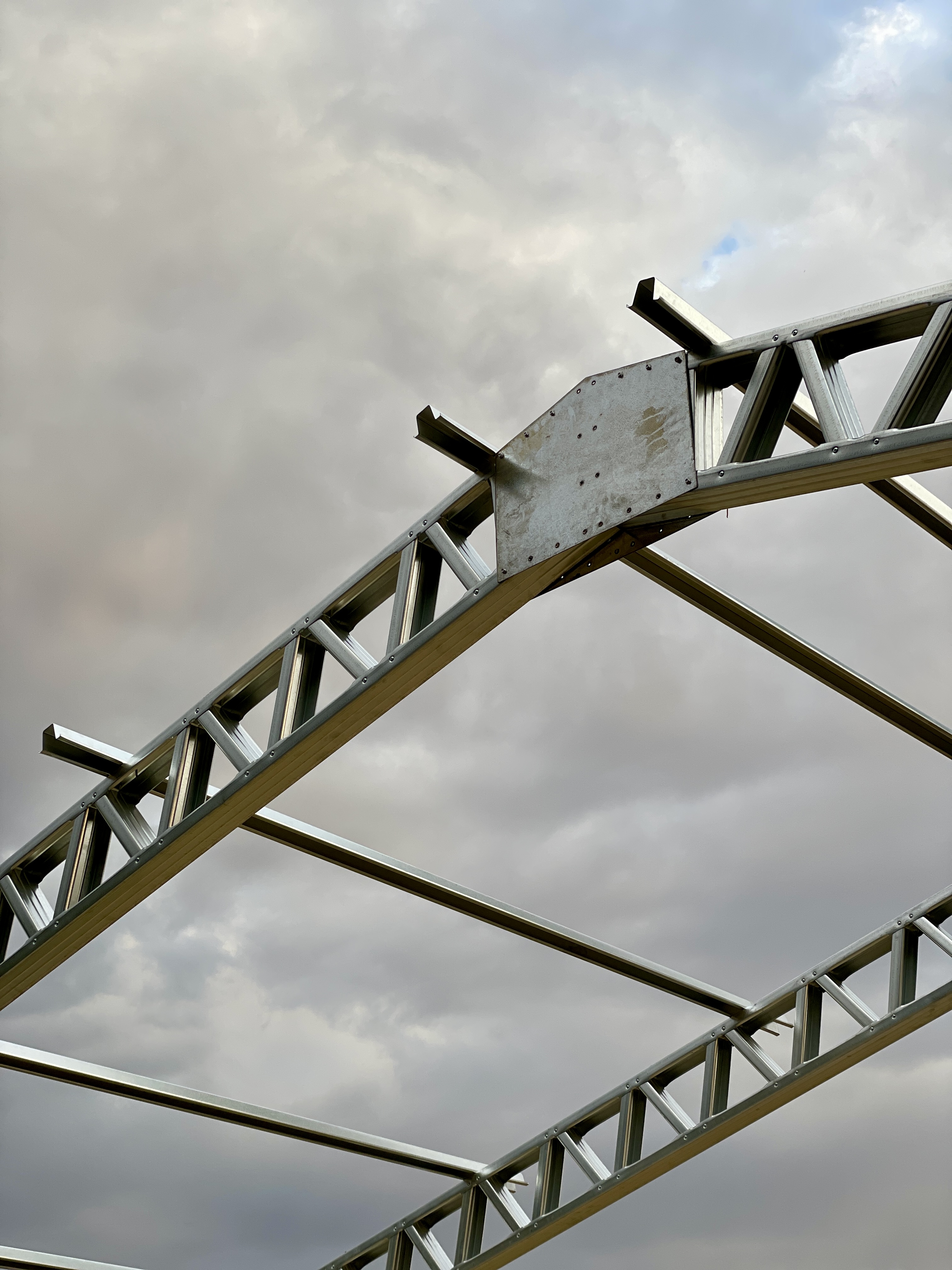 Prefabricated lightweight steel trusses for residential and commercial buildings